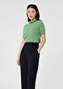 Pull Peer vert en cachemire Amande, Nuit, Vieux rose TARA JARMON